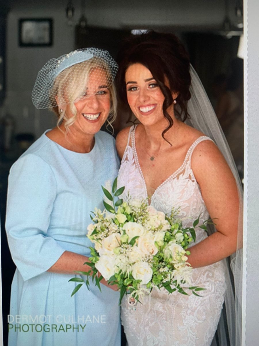 mother of the bride in blue hat